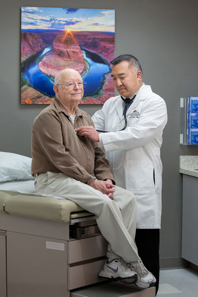 Dr. Arnold Chung treating patient